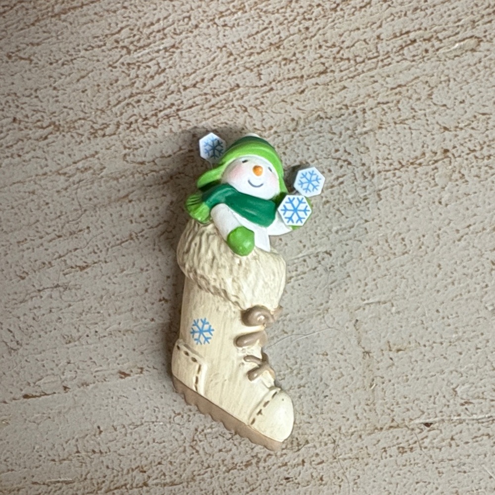 Hallmark ornament “so cute in a boot!”